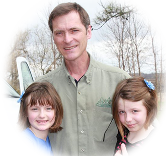 Picture of Andy and his daughters